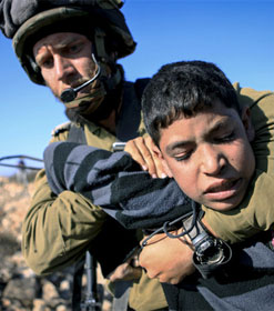 Israeli soldier and Palestinian child