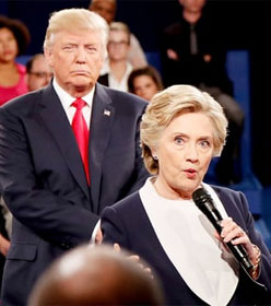 Donald Trump standing behind Hillary Clinton at second presidential debate