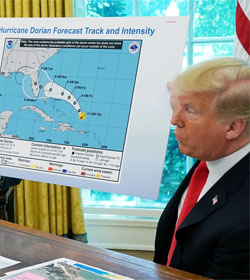 Donald Trump with weather map he altered to show Hurricane Dorian impacting Alabama