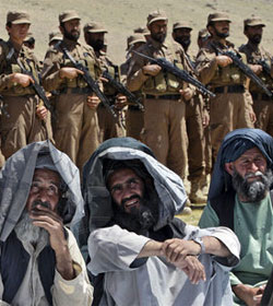Afghan local police with villagers