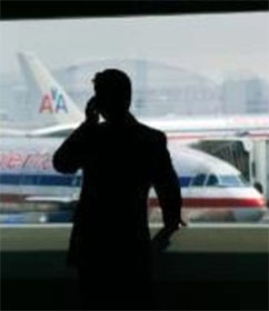 Man on cell phone at airport