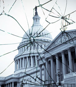 Capitol dome through broken glass