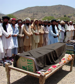 Villagers with coffins