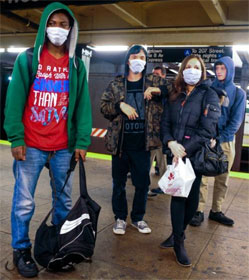 Masked New Yorkers at subway