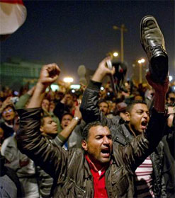 Egyptian protester waving shoe