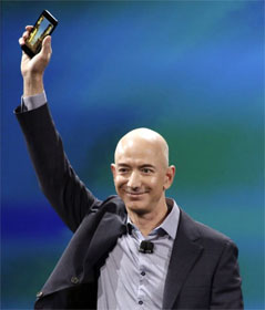 Jeff Bezos holding new Amazon Fire phone