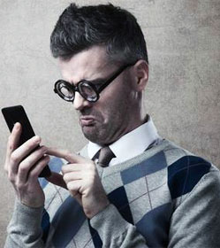 Man perplexed at his "smart" phone