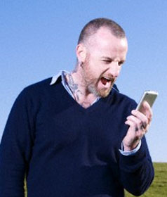 Man yelling at his smartphone