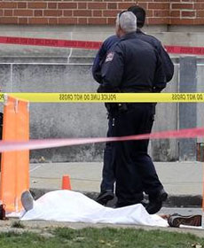 Body of Abdul Razak Ali Artan under sheet
