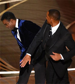Will Smith slapping Chris Rock at the 2022 Academy Awards