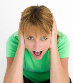 Girl covering ears